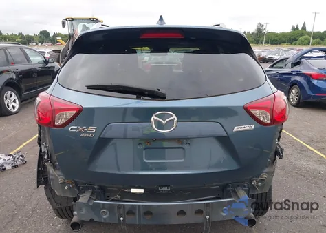 2015 Mazda Cx-5 Grand Touring z USA, uszkodzony, nr VIN JM3KE4DY8F0487613